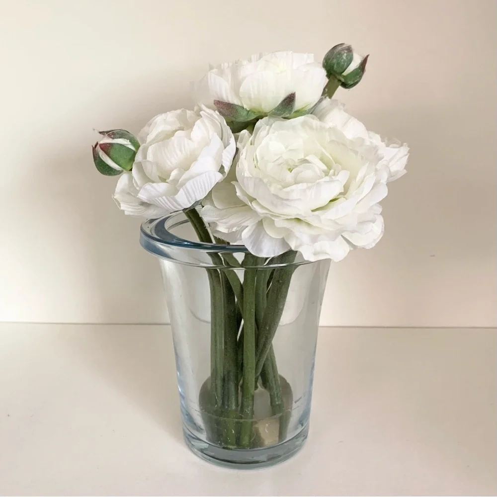 Thomas O’Brien Faux flowers in blue glass vase